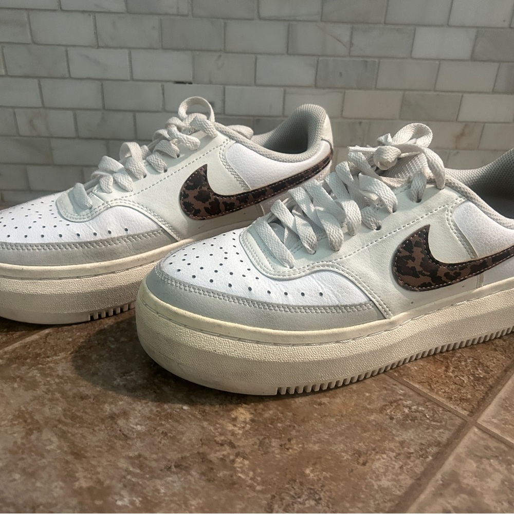 White Nike with leopard swipe